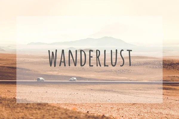 Inspirational typographic quote wanderlust — Stock Photo, Image