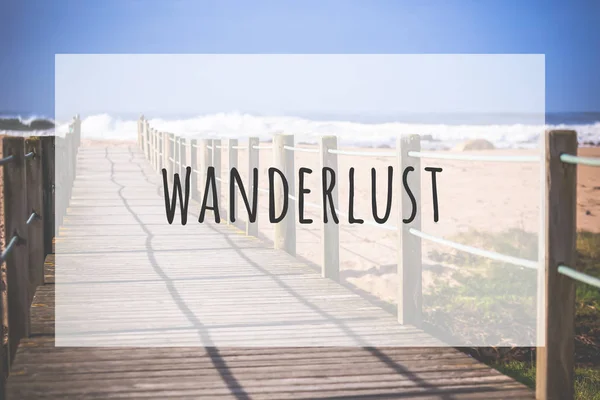 Inspirational typographic quote wanderlust — Stock Photo, Image