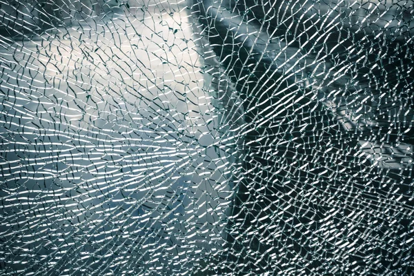 Gebarsten venster gebroken glas achtergrond — Stockfoto