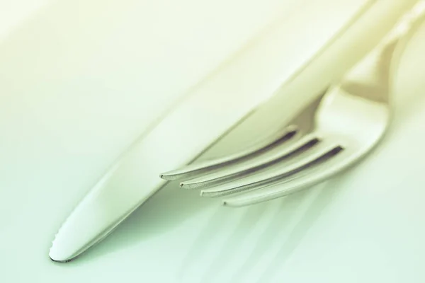 Fork and knife on a white background Stock Image