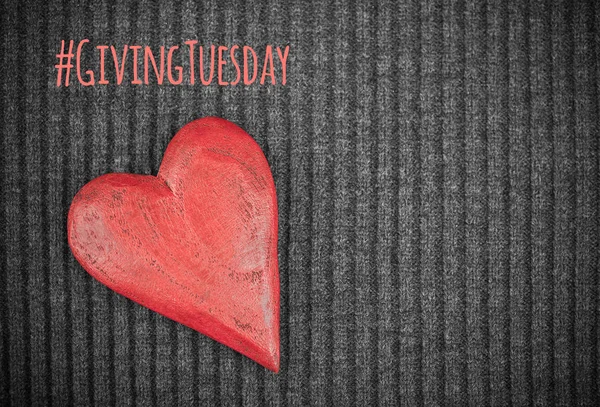 Giving Tuesday concept with wooden red heart — Stock Photo, Image