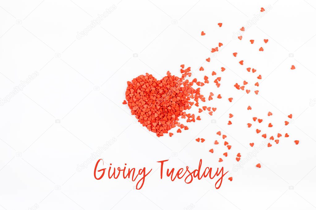 Giving Tuesday concept with red heart on white