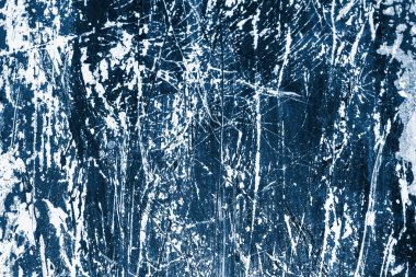 Koyu mavi yüzey arka planında çizikler var