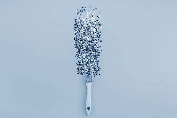 Surreal Paint brush drawing silver stars confetti — Stock Photo, Image