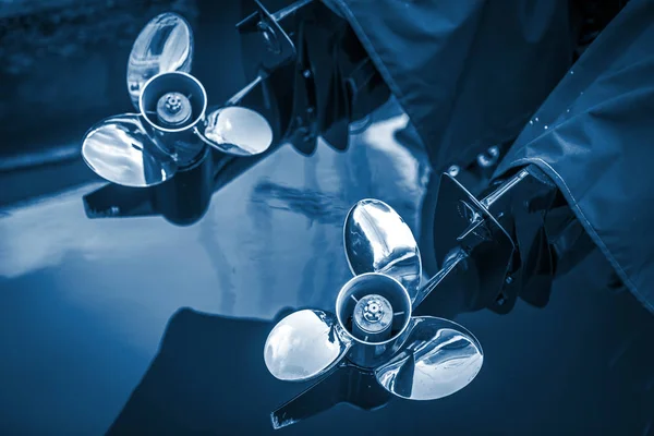 Two boat engine with propeller blue toned — Stock Photo, Image