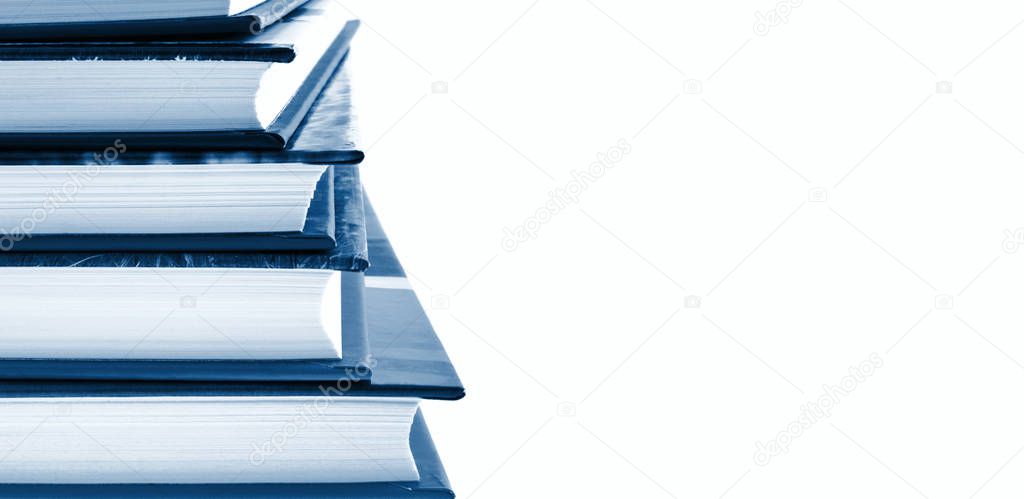 Books stack isolated blue toned