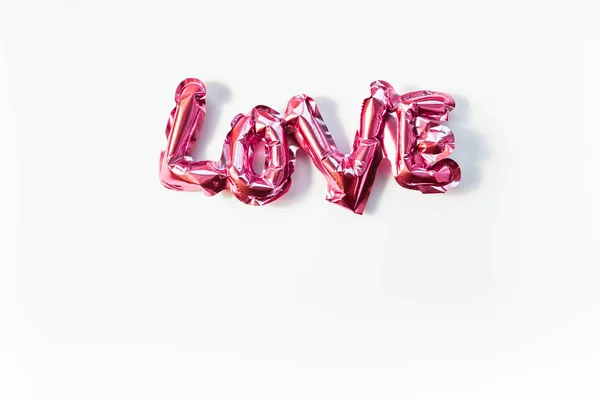 Concepto de amor. Globo rosa inflable con letras — Foto de Stock