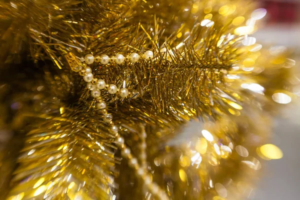 Árbol de Navidad dorado rama fondo —  Fotos de Stock