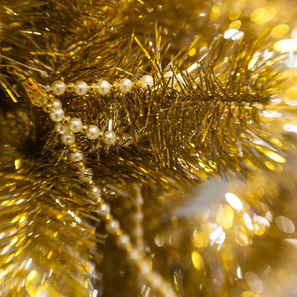 Golden albero di Natale ramo sfondo — Foto Stock