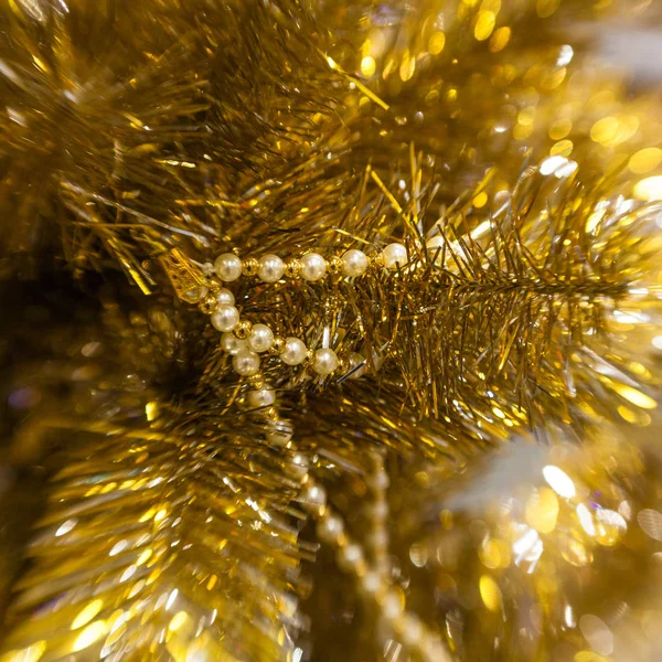 Golden Christmas tree branch background — Stock Photo, Image