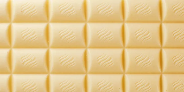 白い多孔質チョコレートマクロ写真の背景 — ストック写真