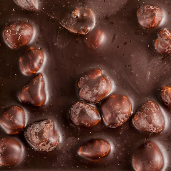 Grandes Avelãs Chocolate Preto Fundo Doces — Fotografia de Stock