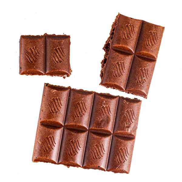 Poröse Schwarze Schokolade Isoliert Auf Weißer Milch — Stockfoto