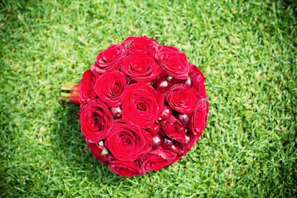 Bridal bouquet with roses and cherries — Stock Photo, Image