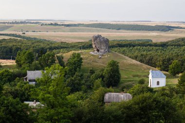 View to Devil's rock in Pidkamin, Lviv region, West Ukraine (summer landscape) clipart