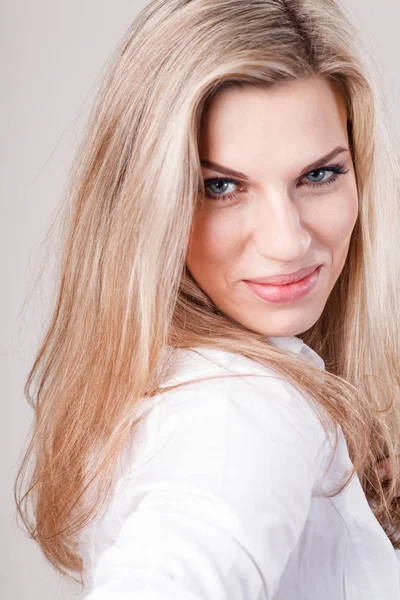 Beautiful blonde business woman in white shirt — Stock Photo, Image