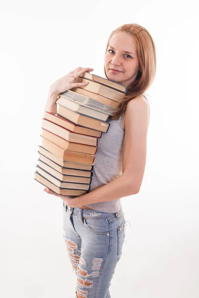 Girl with pile color stacked book on white — Stock Photo, Image