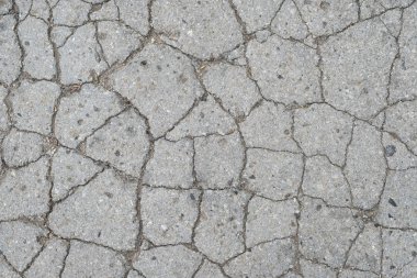 Eski yol arka plan - gri yüzeyi asfalt doku kırık.