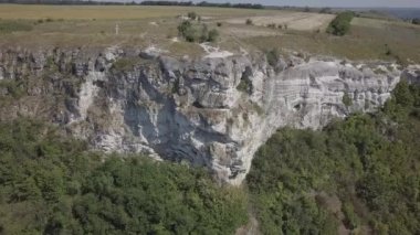 Scenic view rock monastery Bakota on Dniester river, Ukraine