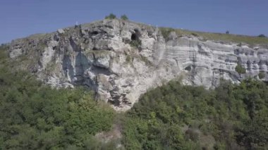Scenic view rock monastery Bakota on Dniester river, Ukraine