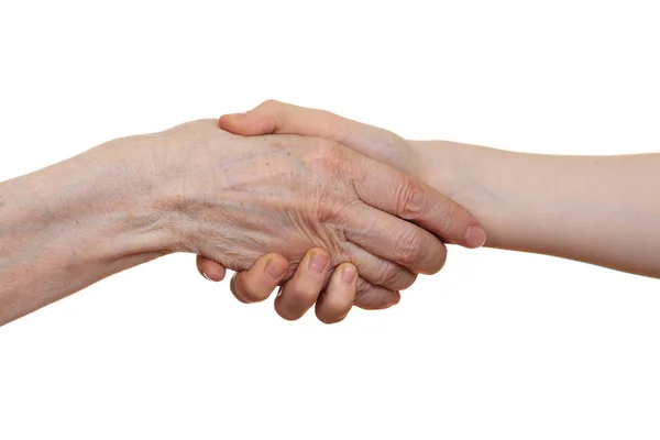 Apretón de manos entre una persona mayor con una mano arrugada y un niño, aislado sobre fondo blanco — Foto de Stock