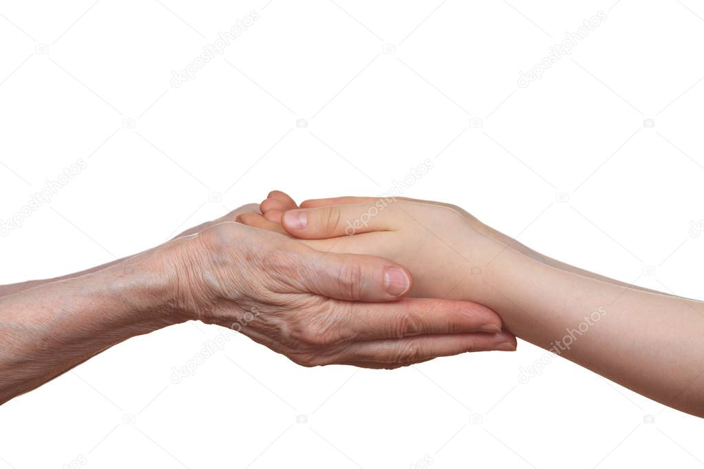 Old and young holding hands of each other, isolated on a white background.