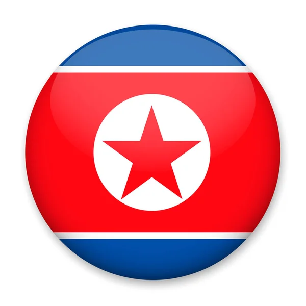 Flagga av Nordkorea i form av en rund knapp med en ljus ljus bländning och en skugga. — Stock vektor