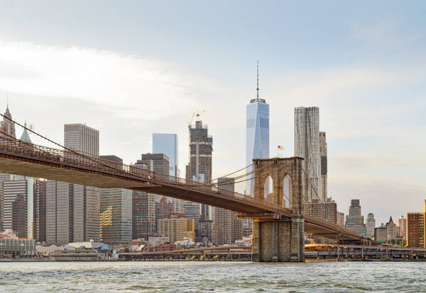 Manhattan skyline with Brooklyn Bridge and Freedom Tower.