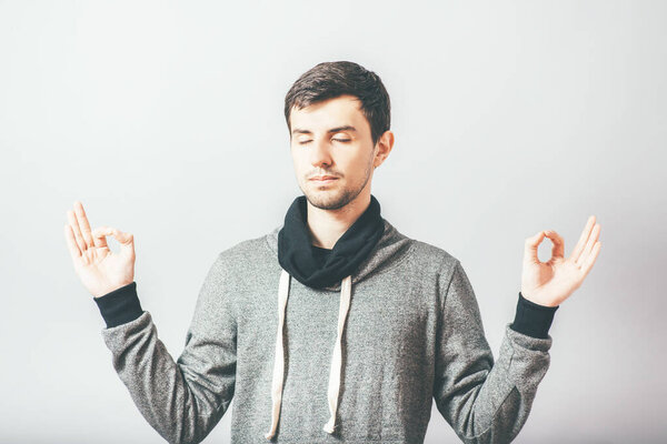 Young businessman, man in peace and harmony