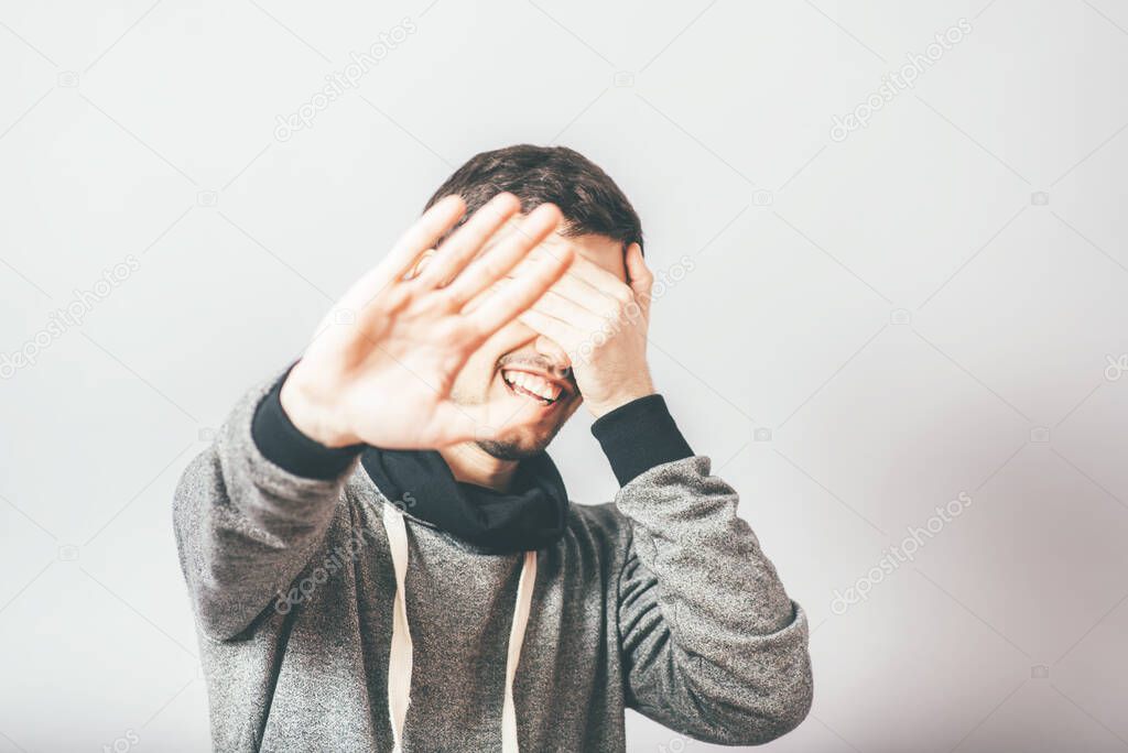 man does not want to be photographed