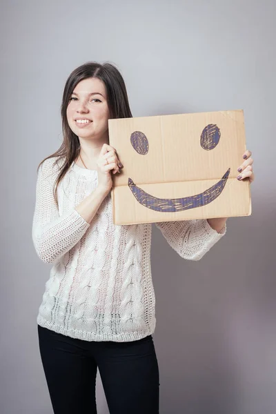 Chica Sosteniendo Feliz Smiley —  Fotos de Stock