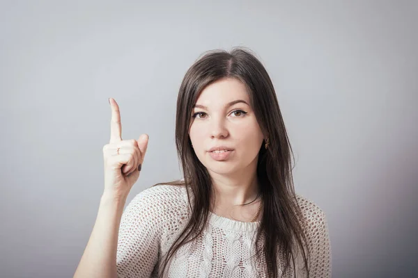 Chica Muestra Dedo Índice Hacia Arriba — Foto de Stock