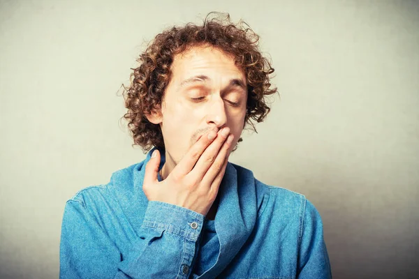 Man Yawns Studio Background — Stock Photo, Image