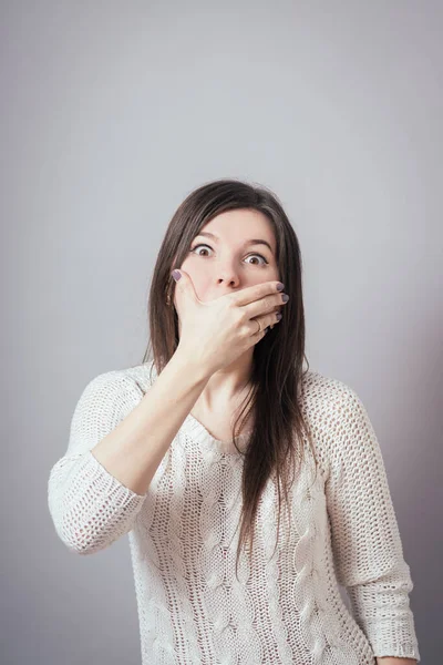 Girl Covers Her Mouth Royalty Free Stock Photos