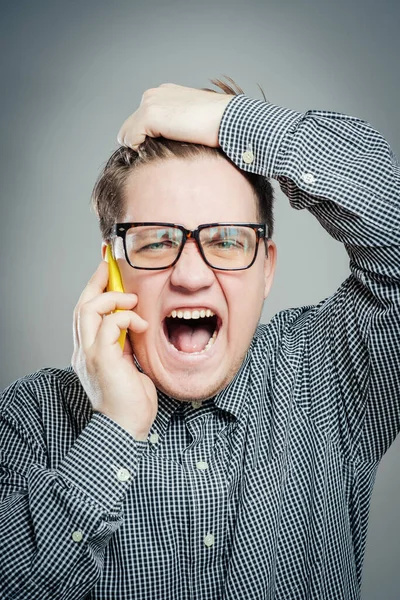 Emocionado Joven Gafas Hablar Por Móvil —  Fotos de Stock