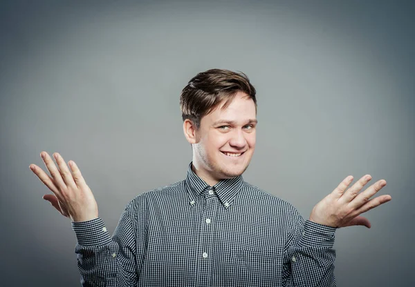 Şaşırmış genç bir adamın portresi. 