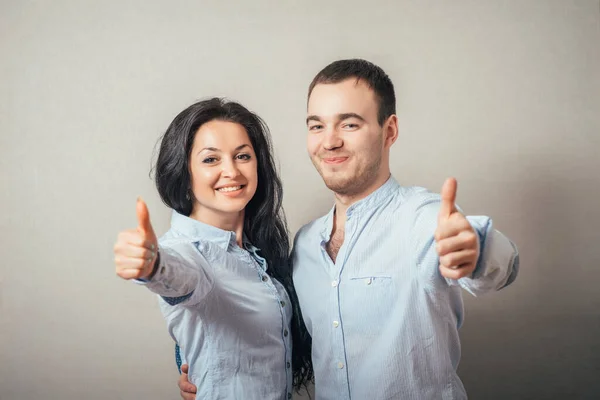 Couple Showing Thumbs — Stock Photo, Image