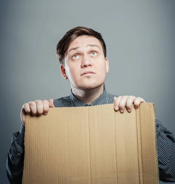 Zakenman Met Leeg Bord Zijn Handen — Stockfoto