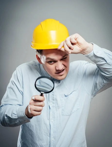 Asian Engineer Man Wear Hardhat Hold Magnifying Glass Focus Glass — Stock Photo, Image