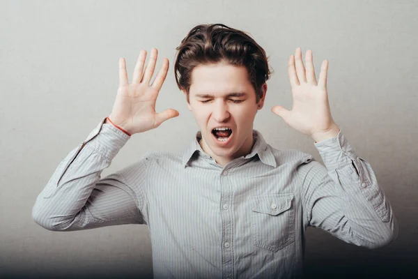 Retrato Joven Haciendo Stop Símbolo Sobre Fondo Gris —  Fotos de Stock