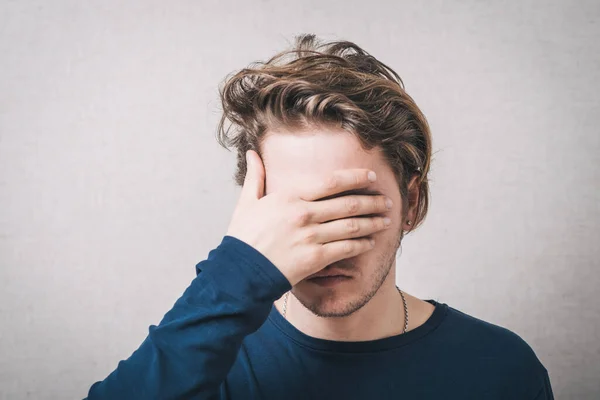 Young Man Covering His Eyes — Stock Photo, Image