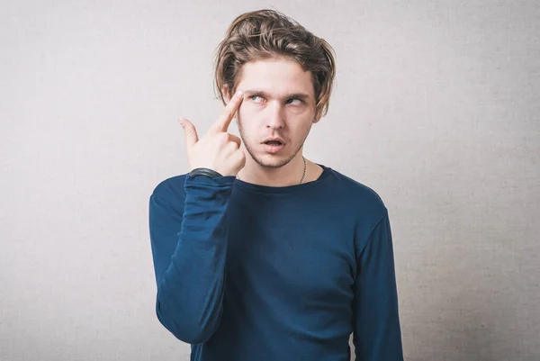 Man Holding His Finger His Temple — Stock Photo, Image