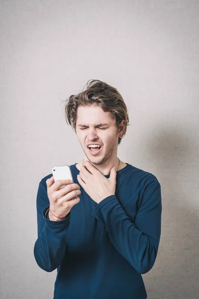 Man Reading Bad News Phone Sms Gray Background — Stock Photo, Image
