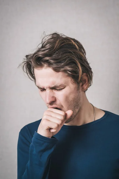Man Coughing His Fist Gray Background — Stock Photo, Image