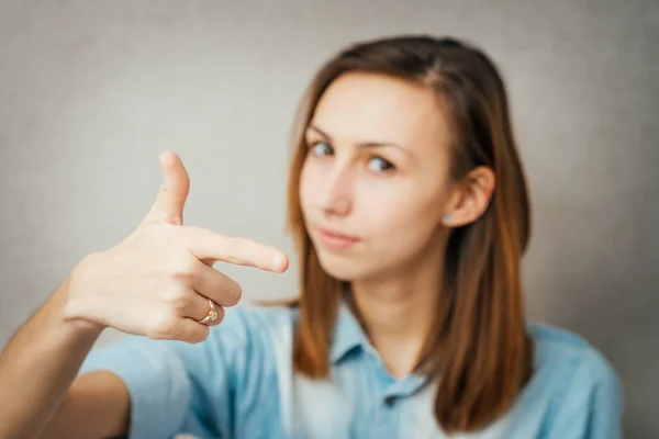 Chica Muestra Dedo Índice Lado — Foto de Stock