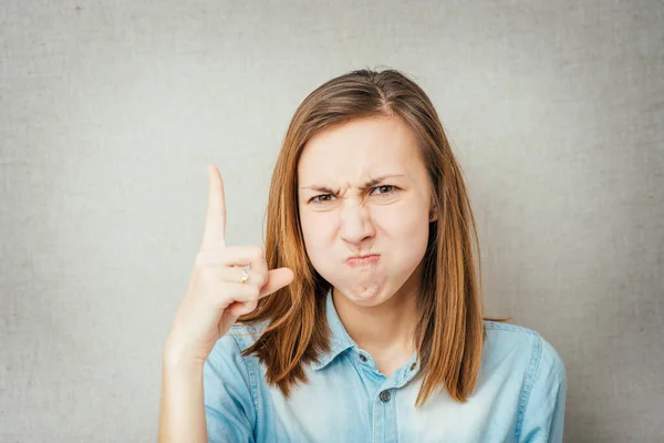 Chica Muestra Dedo Índice Hacia Arriba — Foto de Stock