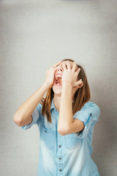 Girl Shouts Hands Covering His Face — Stock Photo, Image