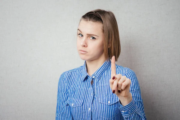 Chica Enseña Muestra Dedo Índice — Foto de Stock