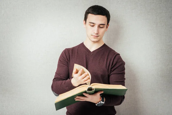 Hombre Elegante Leyendo Libro Grande —  Fotos de Stock