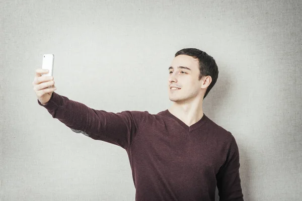 Handsome Young Man Holding Camera Making Selfie Smiling While Standing — Stock Photo, Image